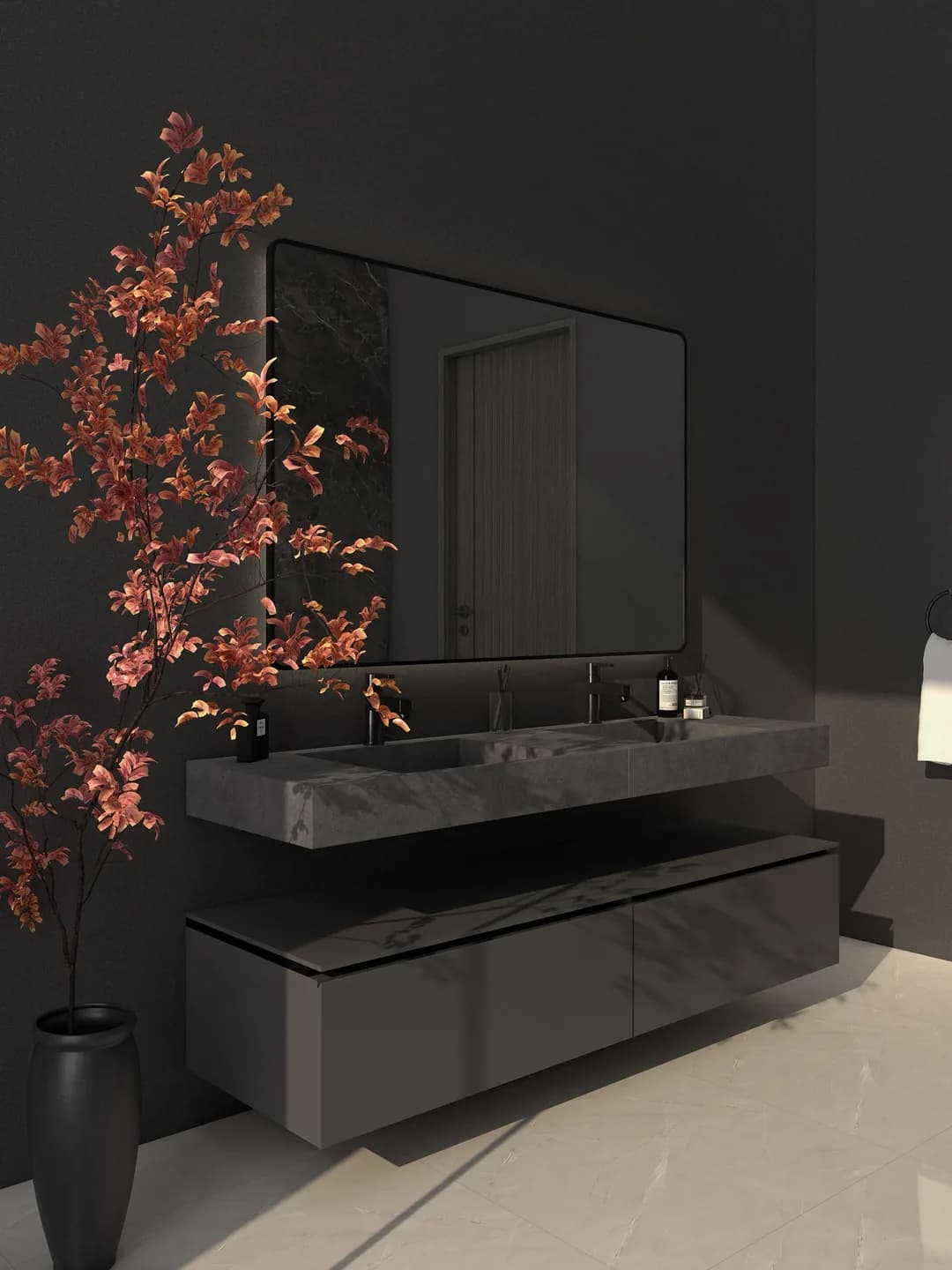 Rendu 3D d’une salle de bains sombre : double vasque en pierre grise, meuble suspendu, grand miroir, branche de cerisier en fleurs.