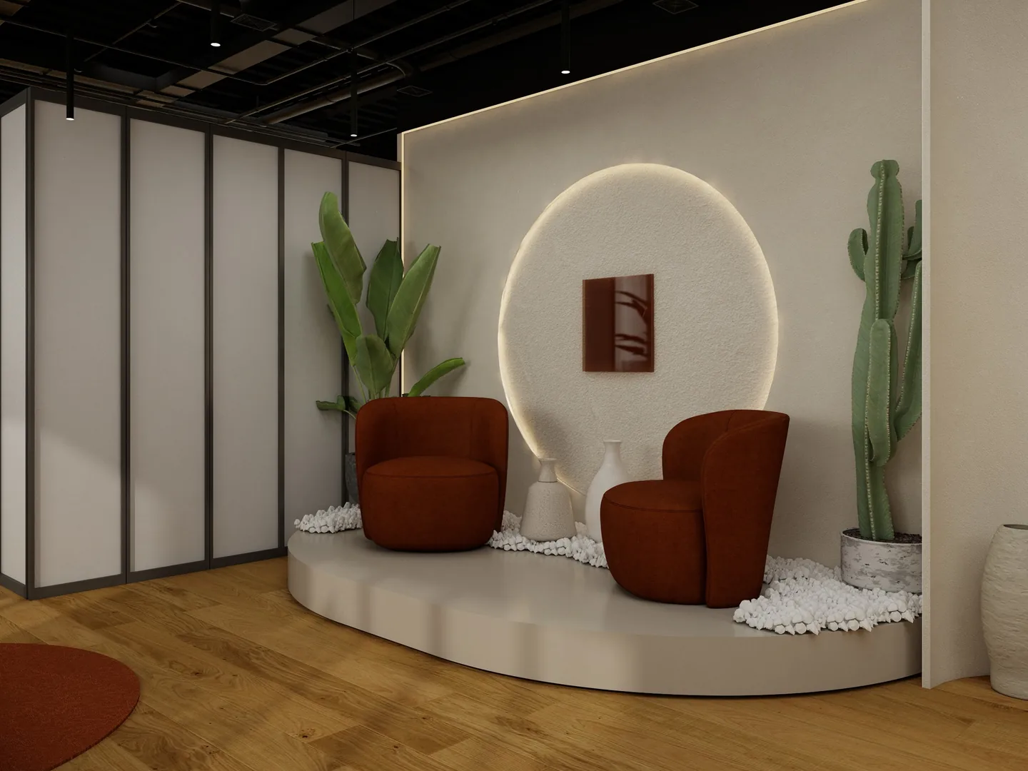 Rendu 3D d’un coin photo : deux fauteuils couleur rouille sur une estrade ronde, cercle lumineux au mur, cactus et grandes plantes.