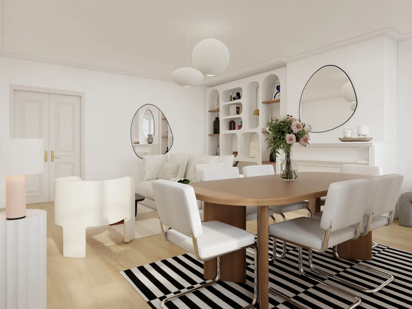 Rendu 3D d’un séjour avec coin repas : table ovale en bois clair, chaises blanches à piètement chromé, bibliothèque à niches en arche, tapis rayé noir et blanc.