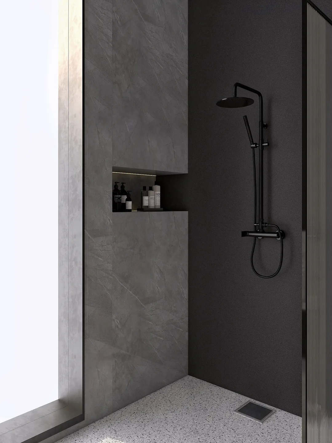 Rendu 3D d’une douche : colonne de douche noire, murs en pierre grise, niche encastrée, sol en granito.