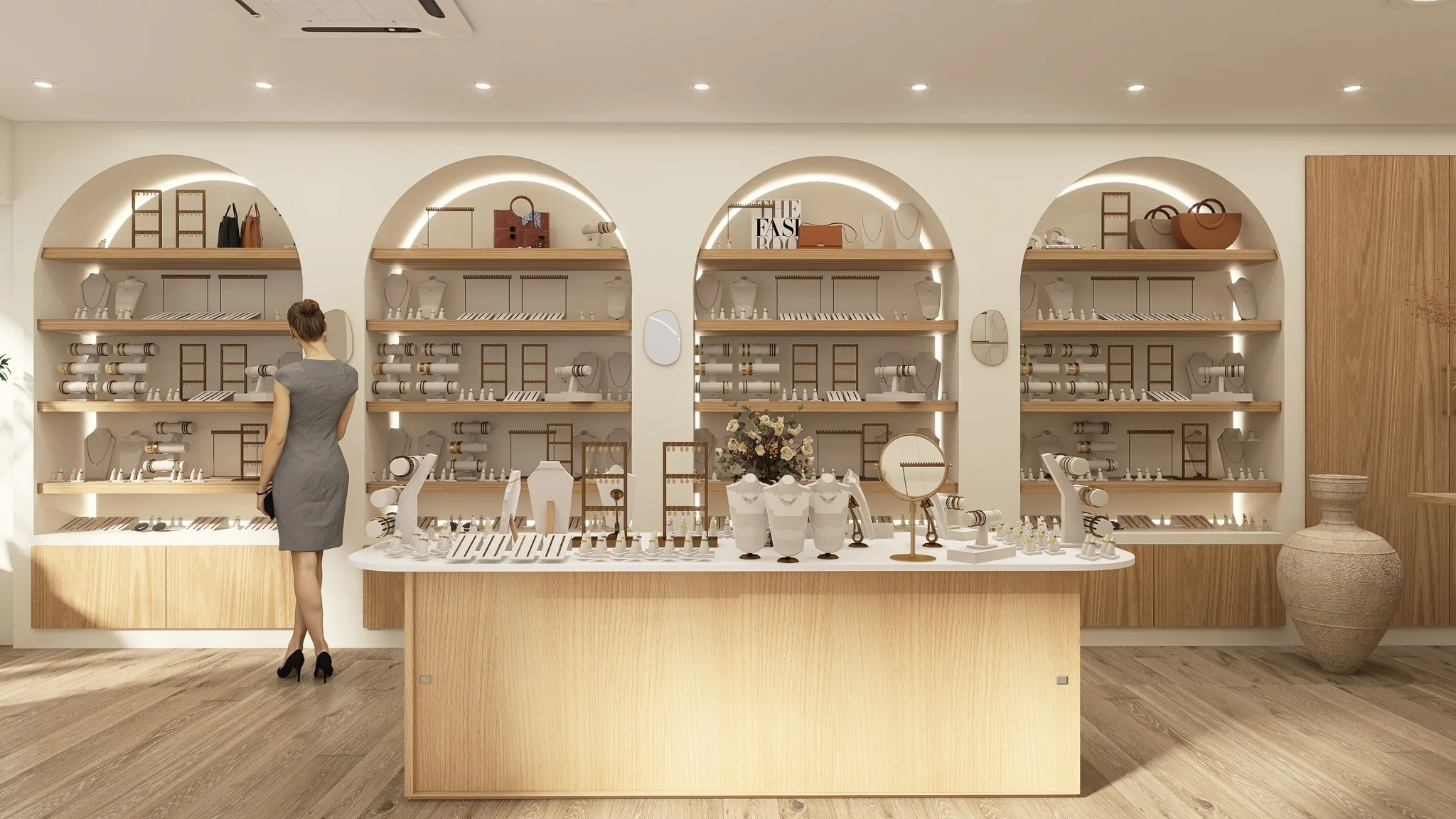 Rendu 3D d’une bijouterie : niches en arche éclairées garnies de bijoux, grand comptoir en bois clair.