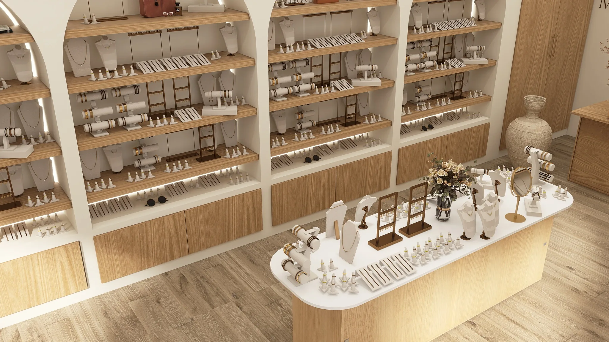 Rendu 3D d’une bijouterie vue d’en haut : niches en arche aux étagères de bijoux, îlot blanc.