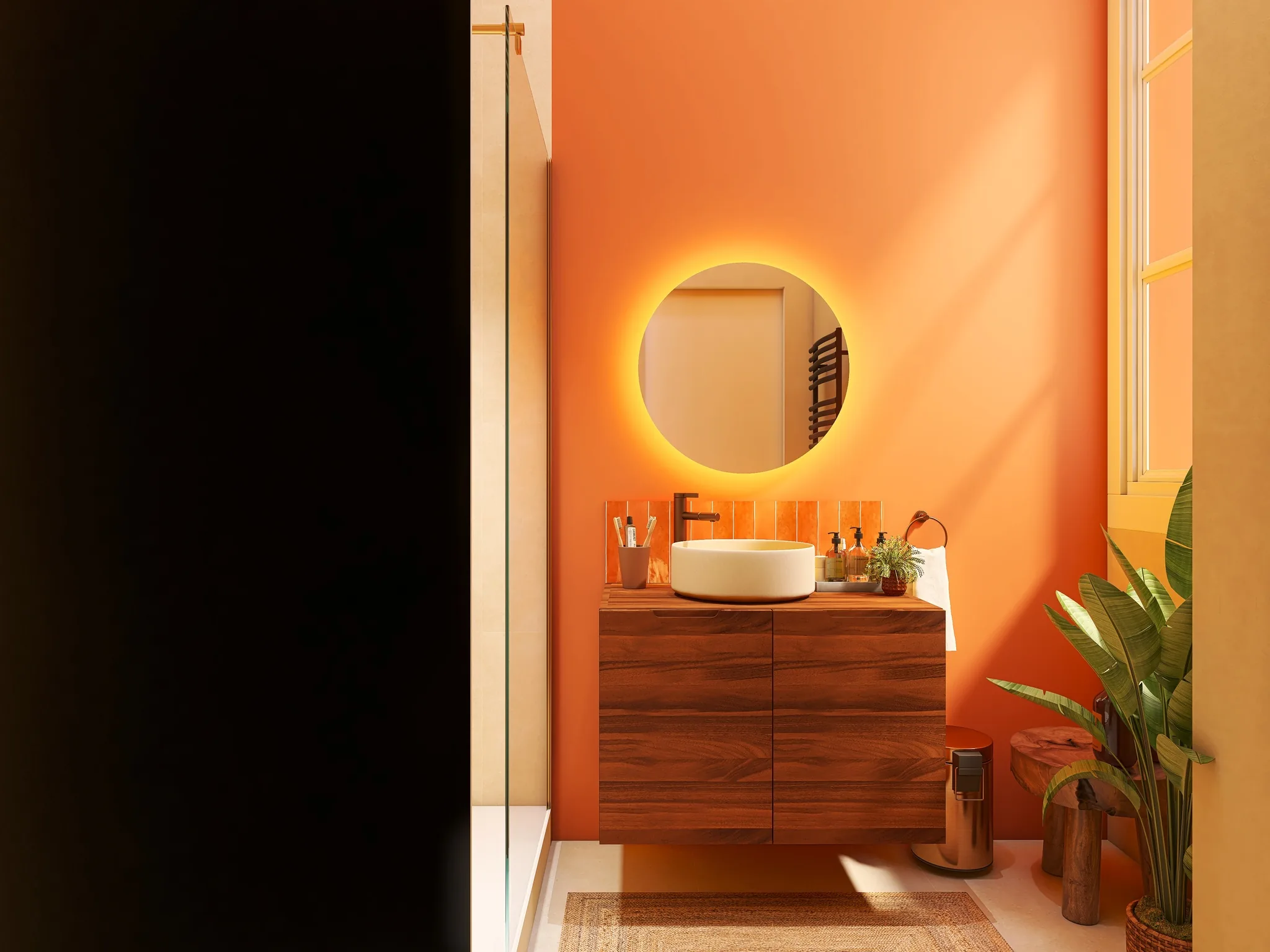 Rendu 3D d’une salle d’eau : mur orange, miroir rond lumineux, vasque blanche sur un meuble en bois.